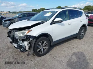 2018 Toyota RAV4 XLE with VIN JTMWFREV7JJ174483, listed as a IAAI auction lot 41597797 with 82,836 mi miles. Bid and sale history available at carsss.com. Image 18.