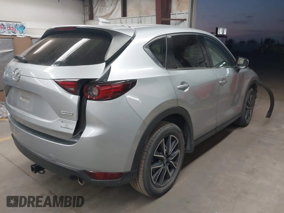 2018 Mazda CX-5 Grand Touring with VIN JM3KFBDM7J0316892, listed as a IAAI auction lot 41885705 with 90,386 mi miles. Bid and sale history available at carsss.com. Image 4.