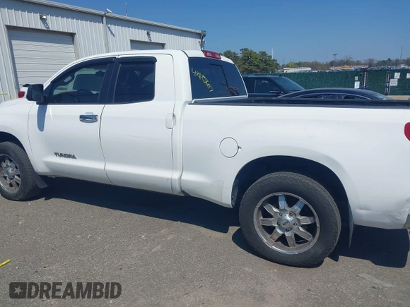 2011 Toyota Tundra 4WD Truck with VIN 5TFUM5F15BX023822, listed as a IAAI auction lot 42125607 with 194,779 mi miles. Bid and sale history available at carsss.com. Image 14.