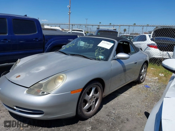1999 Porsche 911 with VIN WP0CA2999XS652816, listed as a IAAI auction lot 41975822 with 291,258 mi miles and . Bid and sale history available at DreamBid. Image 2.