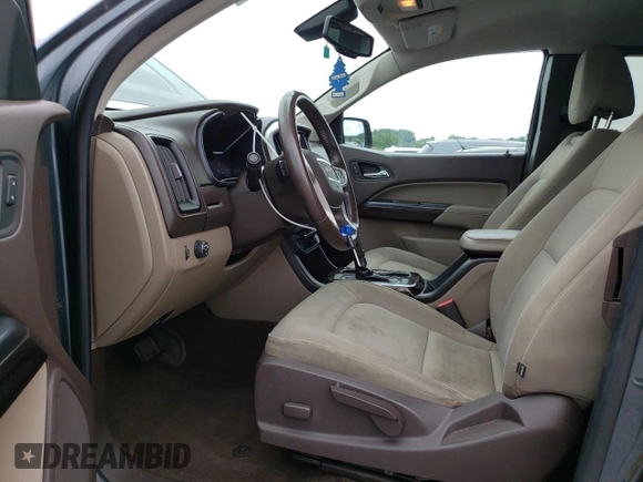 2015 GMC Canyon 2WD SLE with VIN 1GTH5BEA7F1158758, listed as a Copart auction lot 63617524 with 102,744 mi miles and Salvage Title. Bid and sale history available at carsss.com. Image 7.
