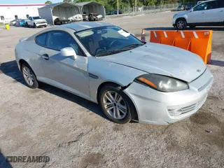 2008 Hyundai Tiburon GS with VIN KMHHM66D98U292591, listed as a IAAI auction lot 42021445 with 219,750 mi miles. Bid and sale history available at carsss.com. Image 1.