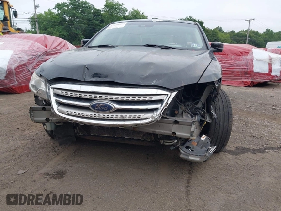 2010 Ford Taurus SHO with VIN 1FAHP2KT7AG132561, listed as a IAAI auction lot 31602484 with 118,333 mi miles and . Bid and sale history available at DreamBid. Image 6.