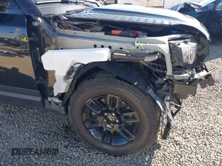 2024 Land Rover Defender S with VIN SALEJ7EX5R2258168, listed as a IAAI auction lot 42837323 with 28,495 mi miles and . Bid and sale history available at DreamBid. Image 18.