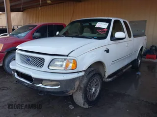1998 Ford F-150 with VIN 1FTZX18W5WNB68293, listed as a IAAI auction lot 41403989 with 217,473 mi miles and . Bid and sale history available at DreamBid. Image 2.