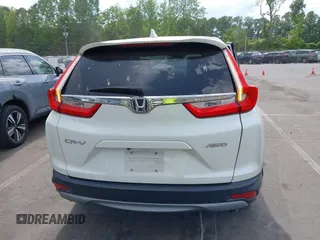 2018 Honda CR-V EX-L z VIN 2HKRW2H86JH682270, wystawiony jako IAAI lot #42182149 z przebiegiem 72 680 mil mil oraz . Historia ofert i sprzedaży dostępna na DreamBid. Obrazek 16.