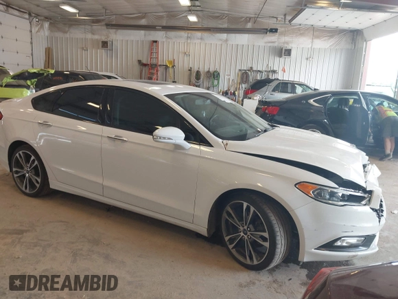 2017 Ford Fusion Titanium with VIN 3FA6P0D9XHR136815, listed as a IAAI auction lot 42596651 with 109,608 mi miles and . Bid and sale history available at DreamBid. Image 1.