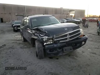 2001 Dodge Durango z VIN 1B4HS28Z21F637575, wystawiony jako Copart lot #83012674 z przebiegiem 276 619 mil mil oraz Szkoda całkowita • Salvage title. Historia ofert i sprzedaży dostępna na DreamBid. Obrazek 10.