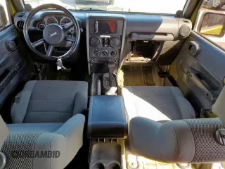 2007 Jeep Wrangler Unlimited Sahara z VIN 1J4GB591X7L165493, wystawiony jako Copart lot #47468205 z przebiegiem Nie podano mil oraz Czysty tytuł • Clean title. Historia ofert i sprzedaży dostępna na DreamBid. Obrazek 8.