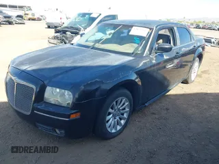 2007 Chrysler 300 Touring with VIN 2C3KA53G97H792641, listed as a IAAI auction lot 42071649 with 144,258 mi miles. Bid and sale history available at carsss.com. Image 2.