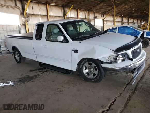 2003 Ford F-150 XL with VIN 1FTRX17L13NB49209, listed as a Copart auction lot 44453395 with 145,262 mi miles and Salvage Title. Bid and sale history available at carsss.com. Image 4.