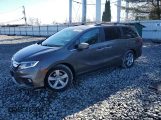 2018 Honda Odyssey EX-L with VIN 5FNRL6H75JB044985, listed as a Copart auction lot 50081345 with 157,688 mi miles and Salvage Title. Bid and sale history available at DreamBid. Image 1.