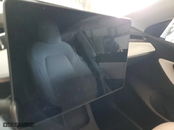 2022 Tesla Model Y Long Range with VIN 7SAYGDEE8NF339790, listed as a Copart auction lot 46187035 with 0 mi miles and Salvage Title. Bid and sale history available at carsss.com. Image 9.
