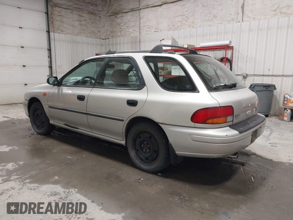 1999 Subaru Impreza L with VIN JF1GF4357XH811307, listed as a IAAI auction lot 41505426 with 195,693 mi miles and . Bid and sale history available at DreamBid. Image 3.