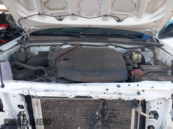 2015 Toyota Tacoma with VIN 3TMMU4FN0FM084956, listed as a IAAI auction lot 42184249 with 116,576 mi miles and . Bid and sale history available at DreamBid. Image 10.