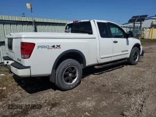 2012 Nissan Titan PRO-4X with VIN 1N6AA0CC3CN300529, listed as a Copart auction lot 53827945 with 82,331 mi miles and Salvage Title. Bid and sale history available at carsss.com. Image 3.