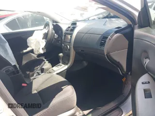 2013 Toyota Corolla L with VIN 5YFBU4EE9DP105916, listed as a IAAI auction lot 42064103 with 263,531 mi miles. Bid and sale history available at carsss.com. Image 5.