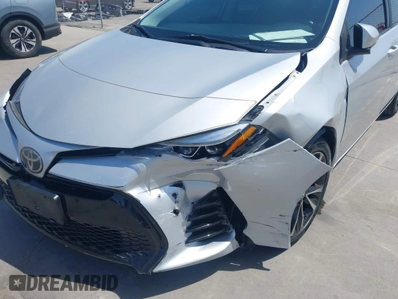 2019 Toyota Corolla L with VIN 5YFBURHE5KP877691, listed as a IAAI auction lot 42108591 with 85,813 mi miles and . Bid and sale history available at DreamBid. Image 6.