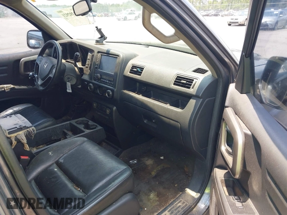 2013 Honda Ridgeline RTL with VIN 5FPYK1F5XDB012354, listed as a IAAI auction lot 42392921 with 248,223 mi miles and . Bid and sale history available at DreamBid. Image 5.