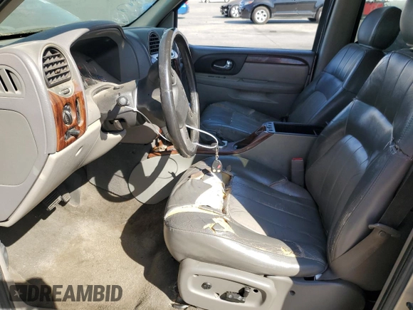 2003 GMC Envoy SLT with VIN 1GKDT13S832327481, listed as a Copart auction lot 72253474 with Not Provided miles and Salvage Title. Bid and sale history available at DreamBid. Image 7.