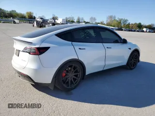 2021 Tesla Model Y Performance with VIN 5YJYGDEF3MF262878, listed as a Copart auction lot 52897595 with 50,939 mi miles and Salvage Title. Bid and sale history available at DreamBid. Image 3.