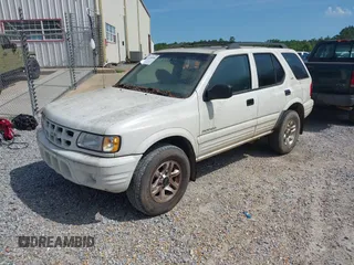 2002 Isuzu Rodeo S с VIN 4S2CK58W024313661, выставлен на аукционе IAAI как лот 42305564 с пробегом 174 949 миль миль и . История ставок и продаж доступна на DreamBid. Изображение 2.