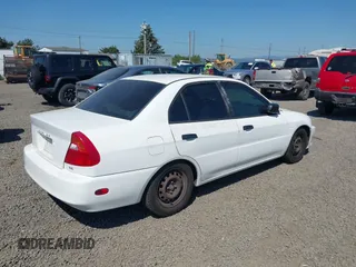 2000 Mitsubishi Mirage DE z VIN JA3AY26C4YU017932, wystawiony jako IAAI lot #42431603 z przebiegiem 193 139 mil mil oraz . Historia ofert i sprzedaży dostępna na DreamBid. Obrazek 4.