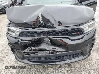 2024 Dodge Durango GT Plus z VIN 1C4RDJDG7RC192232, wystawiony jako Copart lot #59980395 z przebiegiem 27 409 mil mil oraz Czysty tytuł • Clean title. Historia ofert i sprzedaży dostępna na DreamBid. Obrazek 12.