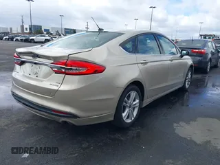 2017 Ford Fusion Hybrid SE with VIN 3FA6P0LU0HR355269, listed as a IAAI auction lot 41745299 with 97,675 mi miles and . Bid and sale history available at DreamBid. Image 4.