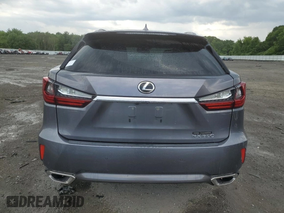 2016 Lexus RX 350 z VIN 2T2BZMCA1GC010235, wystawiony jako Copart lot #62363585 z przebiegiem Nie podano mil oraz Szkoda całkowita • Salvage title. Historia ofert i sprzedaży dostępna na DreamBid. Obrazek 6.