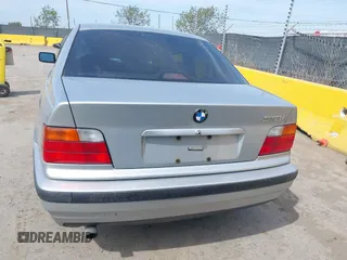 1997 BMW 3 Series 318iA with VIN WBACC0322VEK25478, listed as a IAAI auction lot 42033040 with 212,320 mi miles. Bid and sale history available at carsss.com. Image 16.