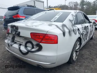 2012 Audi A8 с VIN WAUAVAFD9CN025571, выставлен на аукционе IAAI как лот 41919518 с пробегом 134 341 миль миль и . История ставок и продаж доступна на DreamBid. Изображение 4.