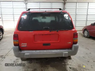 1997 Jeep Grand Cherokee Laredo with VIN 1J4GZ58Y9VC629994, listed as a Copart auction lot 83086694 with 252,147 mi miles and Salvage Title. Bid and sale history available at carsss.com. Image 6.