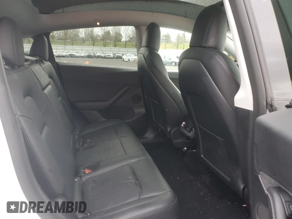 2022 Tesla Model Y Performance with VIN 7SAYGDEFXNF455517, listed as a Copart auction lot 44147905 with 32,210 mi miles and Salvage title. Bid and sale history available at DreamBid. Image 11.