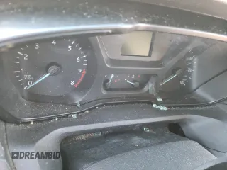 2018 Ford Transit z VIN 1FTYR2CMXJKA73854, wystawiony jako Copart lot #81051414 z przebiegiem Nie podano mil oraz Szkody całkowita. Historia ofert i sprzedaży dostępna na DreamBid. Obrazek 9.