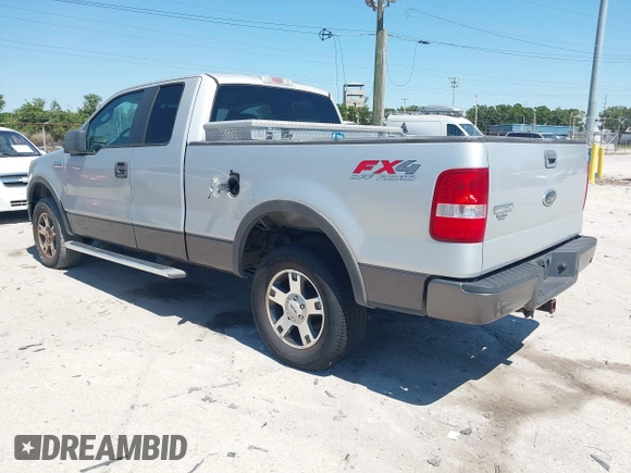 2005 Ford F-150 XLT with VIN 1FTPX14565KC84798, listed as a IAAI auction lot 42064262 with 149,534 mi miles. Bid and sale history available at carsss.com. Image 3.