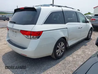 2014 Honda Odyssey EX-L with VIN 5FNRL5H62EB109573, listed as a IAAI auction lot 42387637 with 208,061 mi miles and . Bid and sale history available at DreamBid. Image 4.