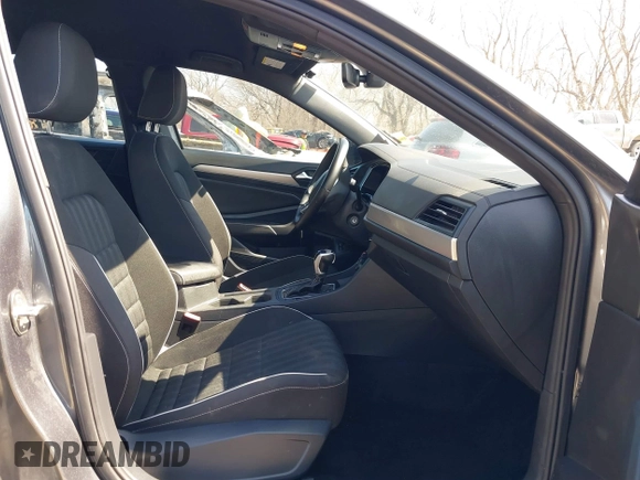 2022 Volkswagen Jetta Sport with VIN 3VWBM7BU6NM017084, listed as a IAAI auction lot 41784555 with 60,364 mi miles and . Bid and sale history available at DreamBid. Image 5.