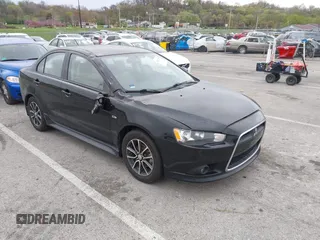 2015 Mitsubishi Lancer SE with VIN JA32V2FW2FU002303, listed as a IAAI auction lot 41927592 with 32,444 mi miles. Bid and sale history available at carsss.com. Image 1.