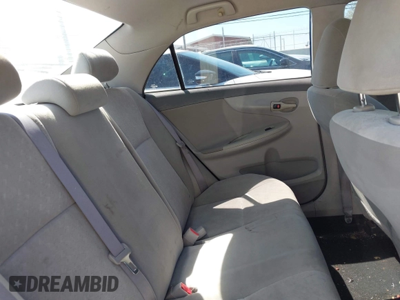 2009 Toyota Corolla with VIN 1NXBU40EX9Z065519, listed as a IAAI auction lot 42057981 with 201,480 mi miles. Bid and sale history available at carsss.com. Image 8.
