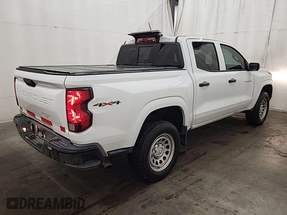 2023 Chevrolet Colorado 4WD Work Truck with VIN 1GCGTBEC5P1199989, listed as a IAAI auction lot 42674419 with 14,286 mi miles and . Bid and sale history available at DreamBid. Image 8.