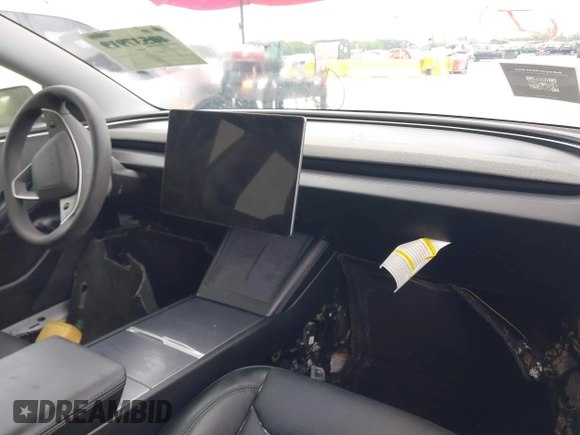 2024 Tesla Model 3 with VIN 5YJ3E1EA6RF751009, listed as a IAAI auction lot 40537919 with Not Provided miles and . Bid and sale history available at DreamBid. Image 5.