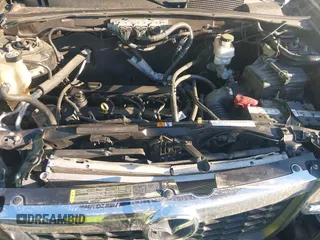 2010 Mazda Tribute Sport with VIN 4F2CY9C74AKM03679, listed as a IAAI auction lot 41740156 with 142,208 mi miles and . Bid and sale history available at DreamBid. Image 10.