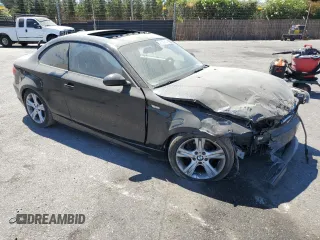 2009 BMW 1 Series 128i z VIN WBAUP73579VF06955, wystawiony jako Copart lot #68562684 z przebiegiem Nie podano mil oraz Szkoda całkowita • Salvage title. Historia ofert i sprzedaży dostępna na DreamBid. Obrazek 4.
