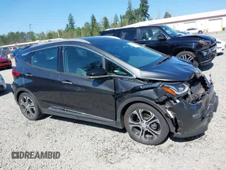 2017 Chevrolet Bolt EV Premier z VIN 1G1FX6S05H4190932, wystawiony jako IAAI lot #42422197 z przebiegiem 59 836 mil mil oraz . Historia ofert i sprzedaży dostępna na DreamBid. Obrazek 13.