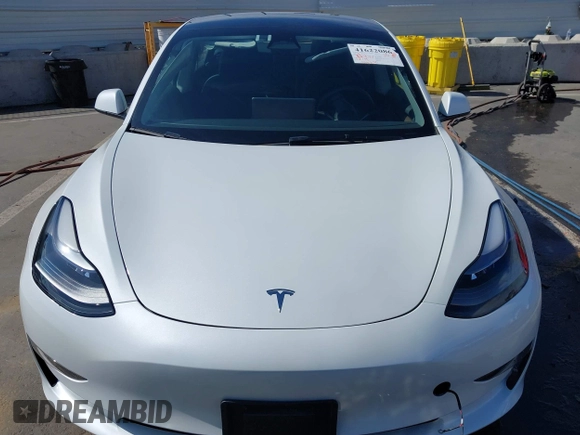 2023 Tesla Model 3 with VIN 5YJ3E1EA9PF640015, listed as a IAAI auction lot 41622086 with 15,622 mi miles and . Bid and sale history available at carsss.com. Image 12.