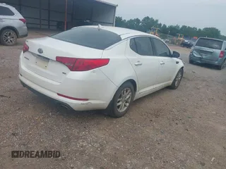 2013 Kia Optima LX z VIN KNAGM4A79D5304780, wystawiony jako IAAI lot #42277179 z przebiegiem 139 841 mil mil oraz . Historia ofert i sprzedaży dostępna na DreamBid. Obrazek 4.