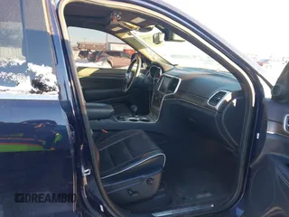 2014 Jeep Grand Cherokee Overland with VIN 1C4RJFCG1EC200570, listed as a IAAI auction lot 41301398 with 183,986 mi miles. Bid and sale history available at carsss.com. Image 5.
