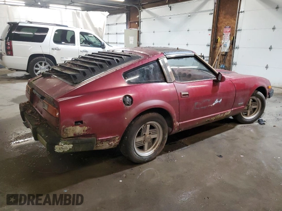 1981 Datsun 280ZX z VIN JN1HZ04S1BX414616, wystawiony jako Copart lot #82249204 z przebiegiem 114 028 mil mil oraz Tytuł czysty. Historia ofert i sprzedaży dostępna na DreamBid. Obrazek 3.