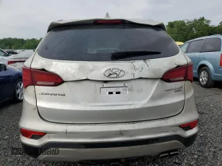 2018 Hyundai Santa Fe Ultimate с VIN 5XYZW4LA5JG545656, выставлен на аукционе Copart как лот 57390895 с пробегом 82 988 миль миль и На запчасти • Non repairable. История ставок и продаж доступна на DreamBid. Изображение 6.